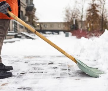 close-up-of-a-man-cleaning-and-clearing-snow-in-fr-2025-03-13-00-53-15-utc-min